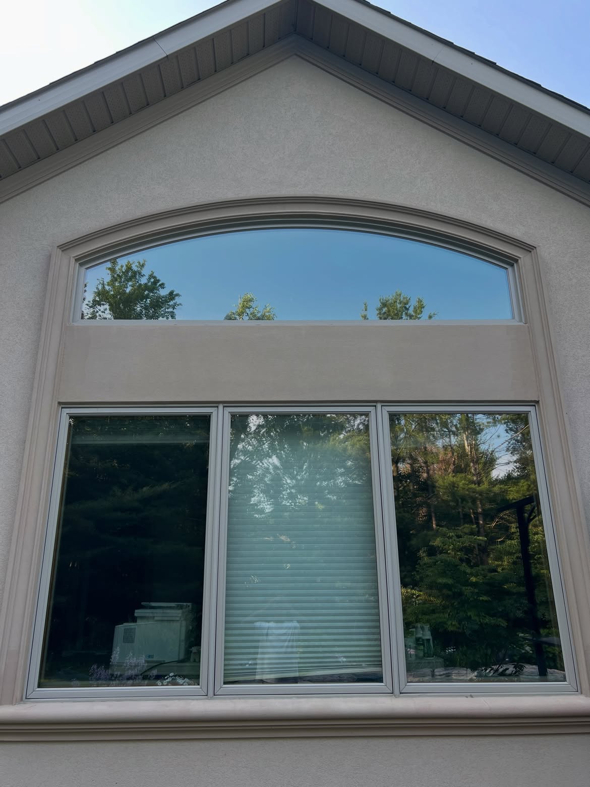 Shine Works crew cleaning windows in Simcoe County